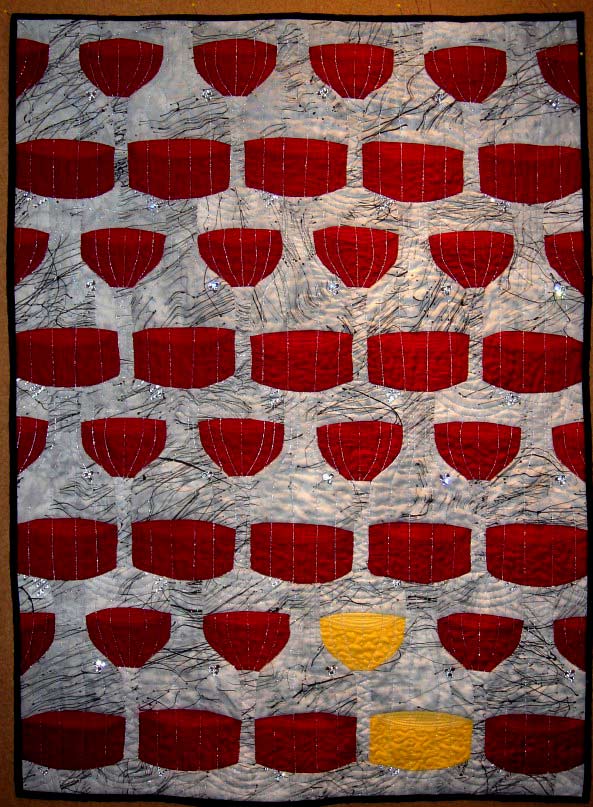 quilt with Escher-style tessellation art